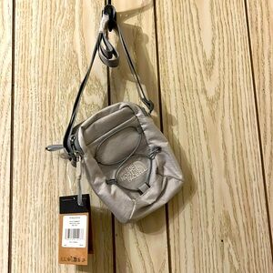The North Face crossbody light grey $18